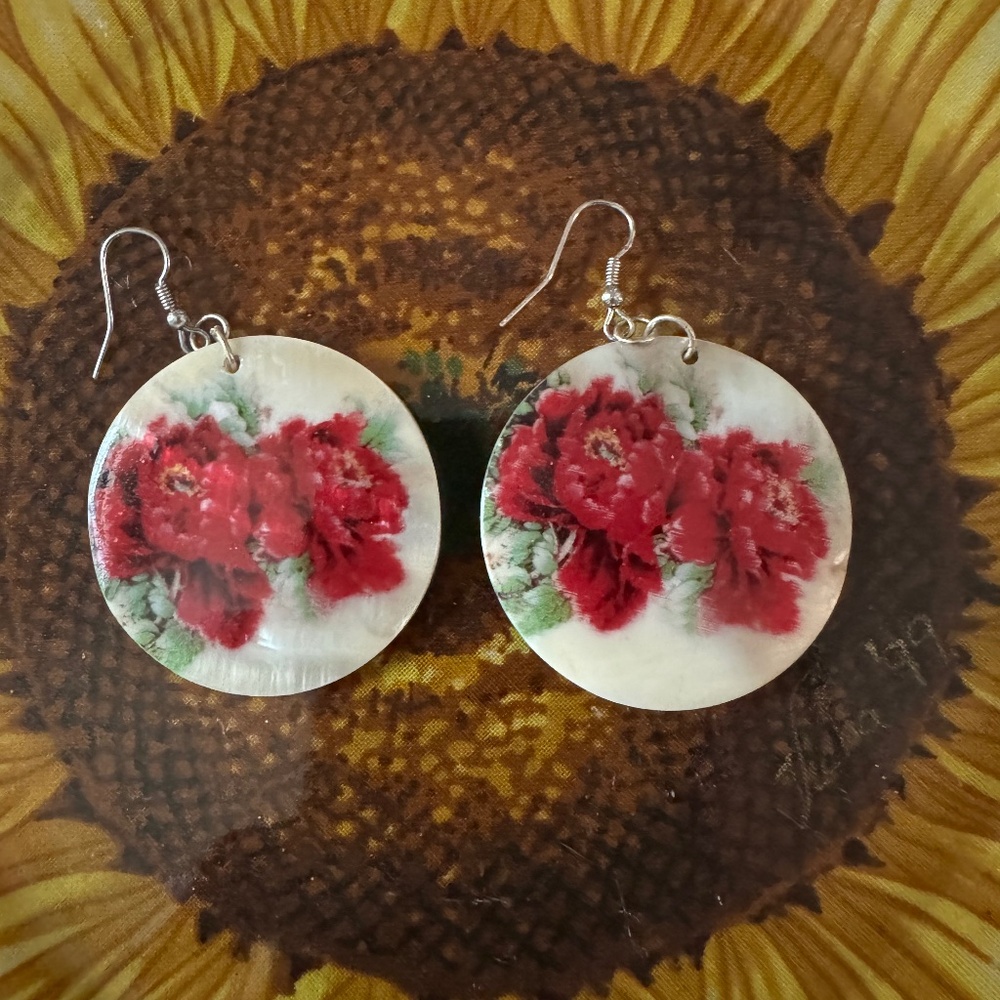 Hand painted mother of pearl earrings.